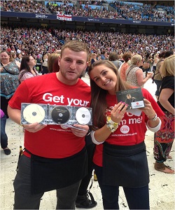 Two of our festival promotional event staff with promotional CD's for sale